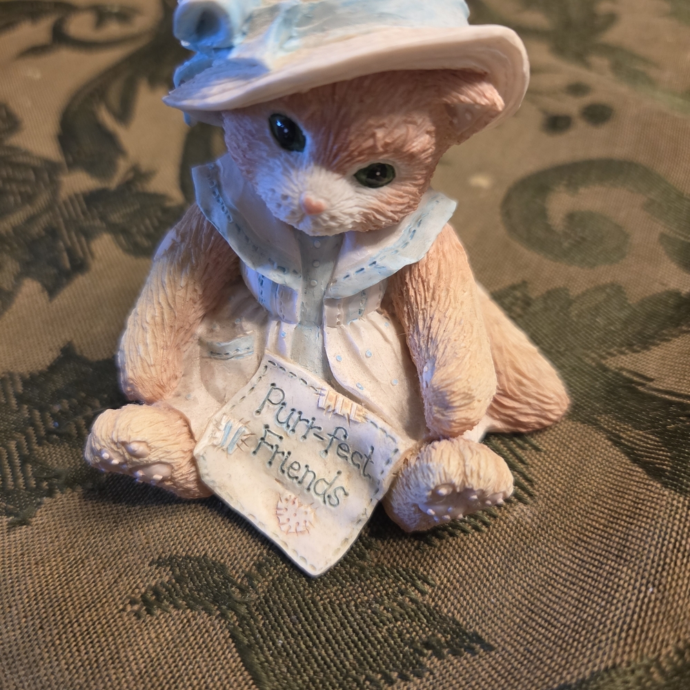 Charming Cat Figurine with Blue and Cream Accents